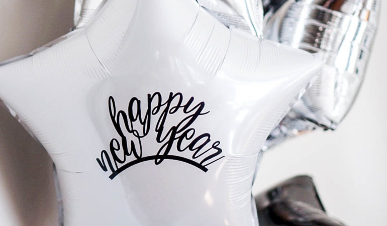 how-to-apply-adhesive-vinyl-to-balloons-for-an-easy-new-years-party