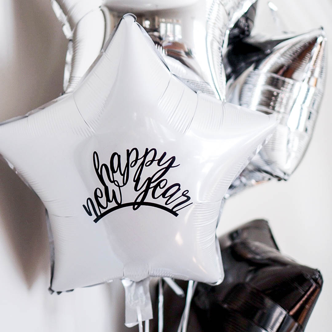 How To Apply Adhesive Vinyl To Balloons For An Easy New Years Party Idea