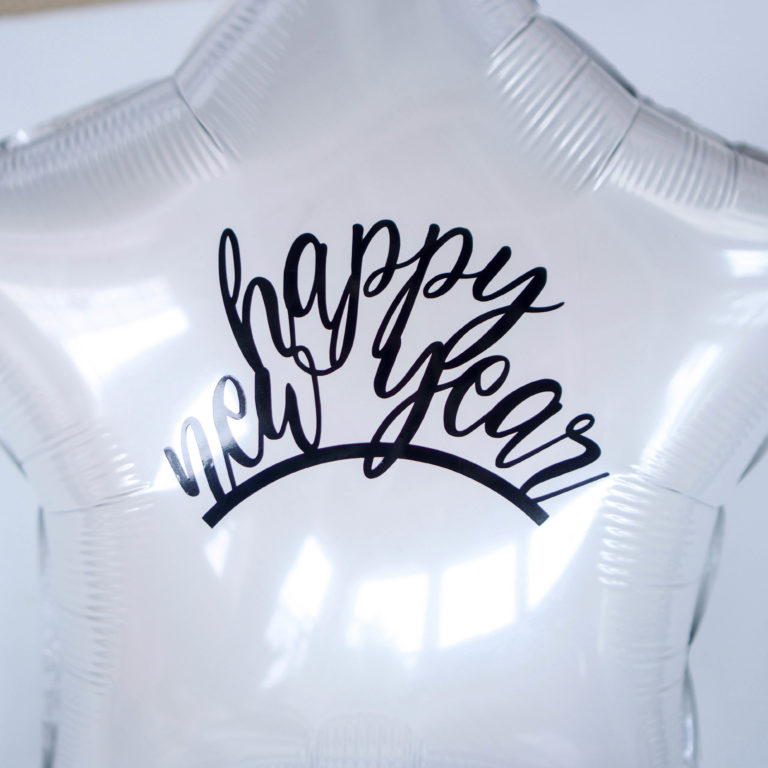 How To Apply Adhesive Vinyl To Balloons For An Easy New Years Party